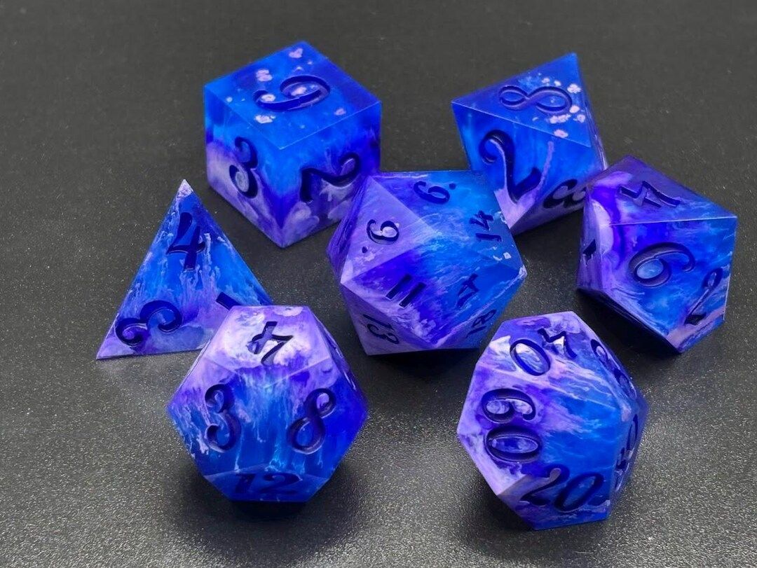 Spectral Abyss Glow-In-The-Dark Transparent Blue And Purple Handmade Resin Sharp-Edge Dice Set DnD — transparent blue with purple swirls