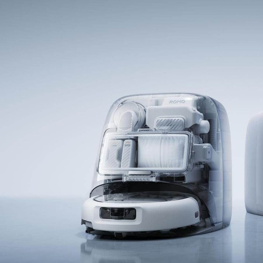 DJI Romo P2 robot vacuum and dock with clear polycarbonate shells revealing white internals