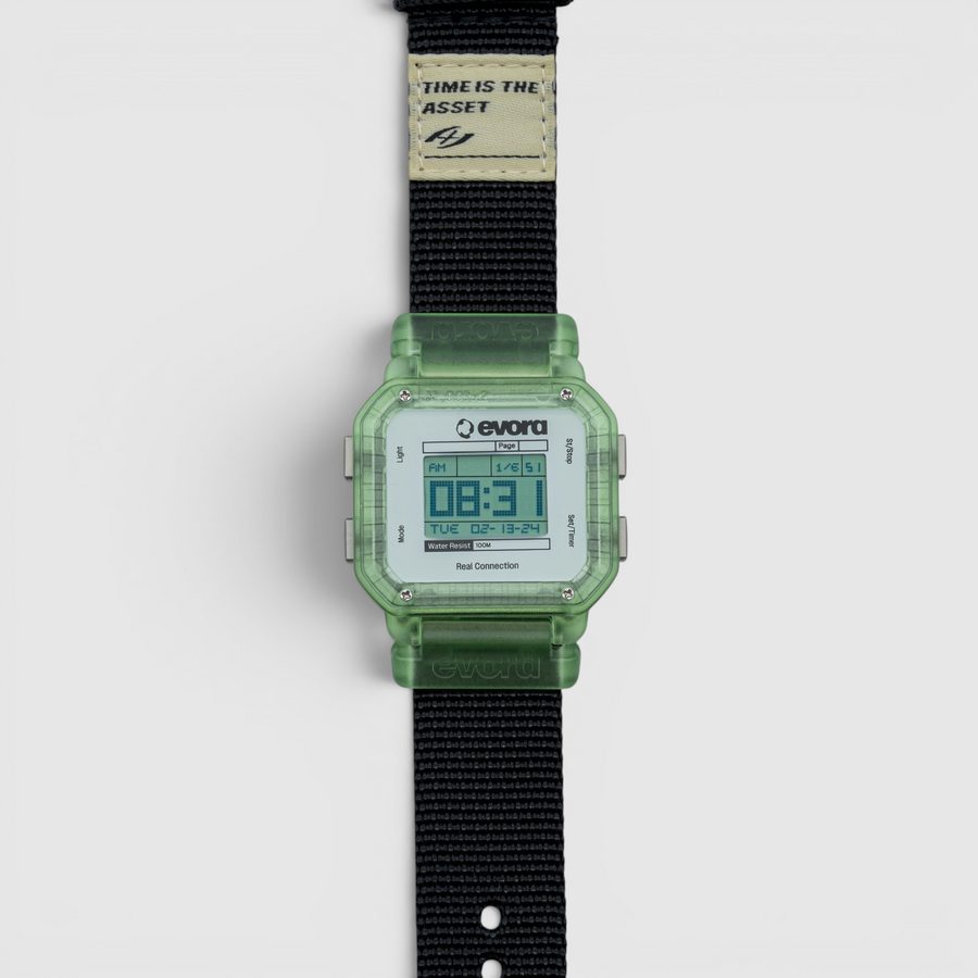 EVORA Seaweed (v2) digital watch with translucent green case on a black nylon band