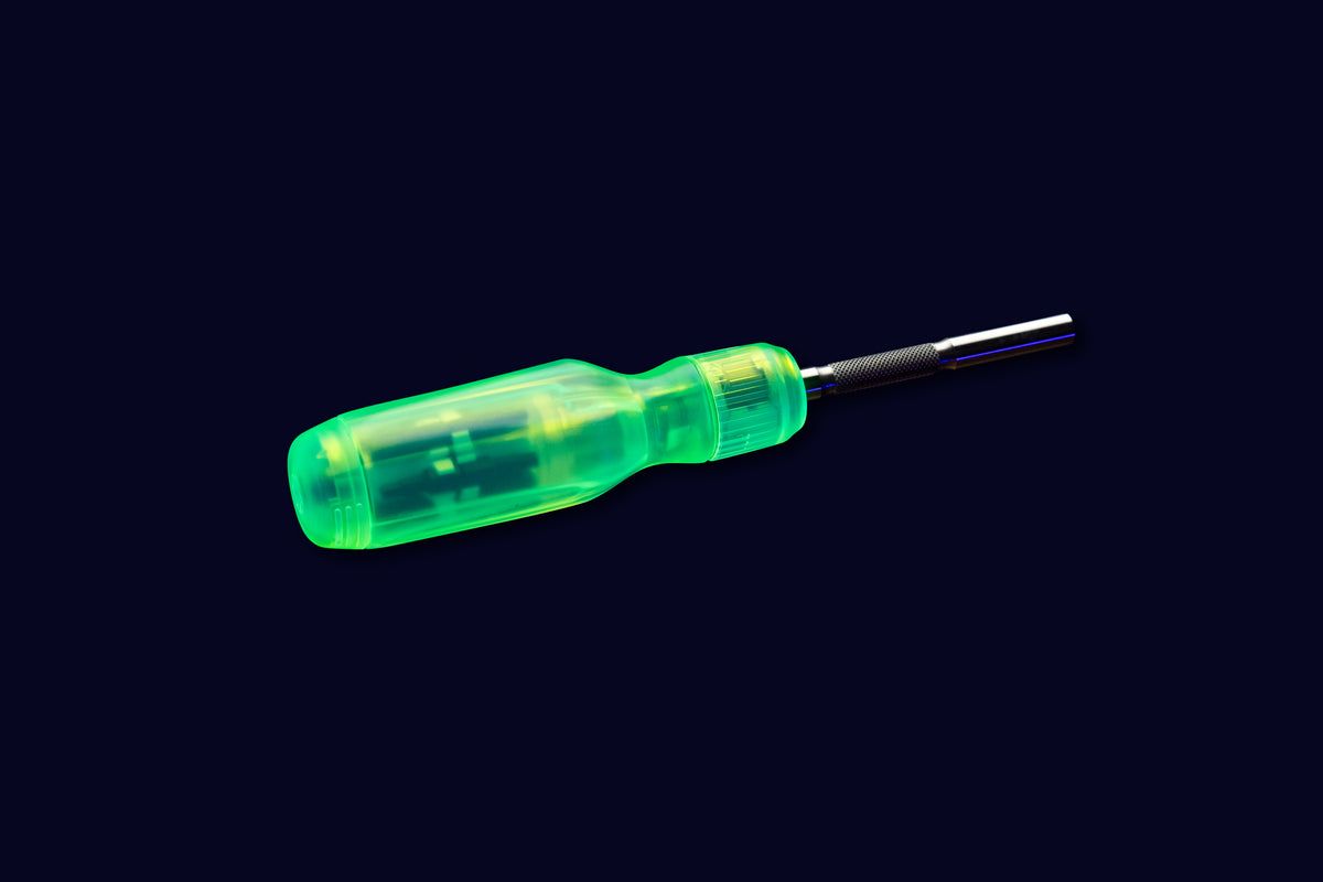 LTT Nuclear Ratcheting Screwdriver with translucent lime-green Tritan handle and visible internal bit storage