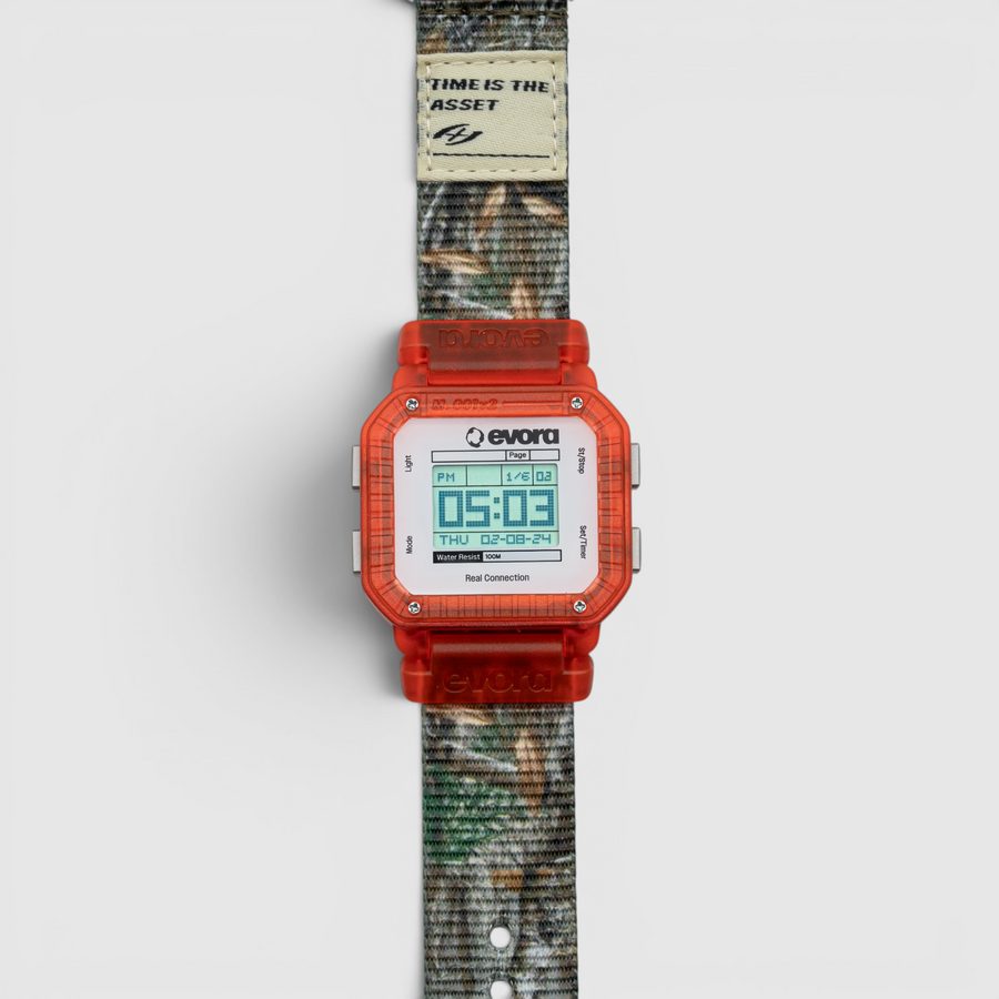 EVORA Vintage Camo (v2) digital watch with translucent orange case on a camo nylon band