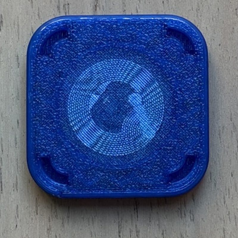 Handmade translucent blue 3D-printed NFC tag