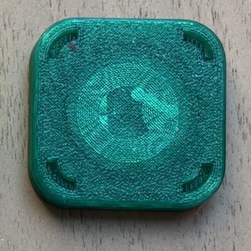 Handmade translucent green 3D-printed NFC tag