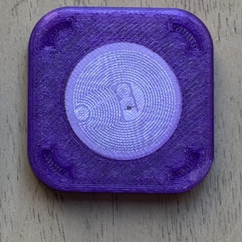 Handmade translucent purple 3D-printed NFC tag