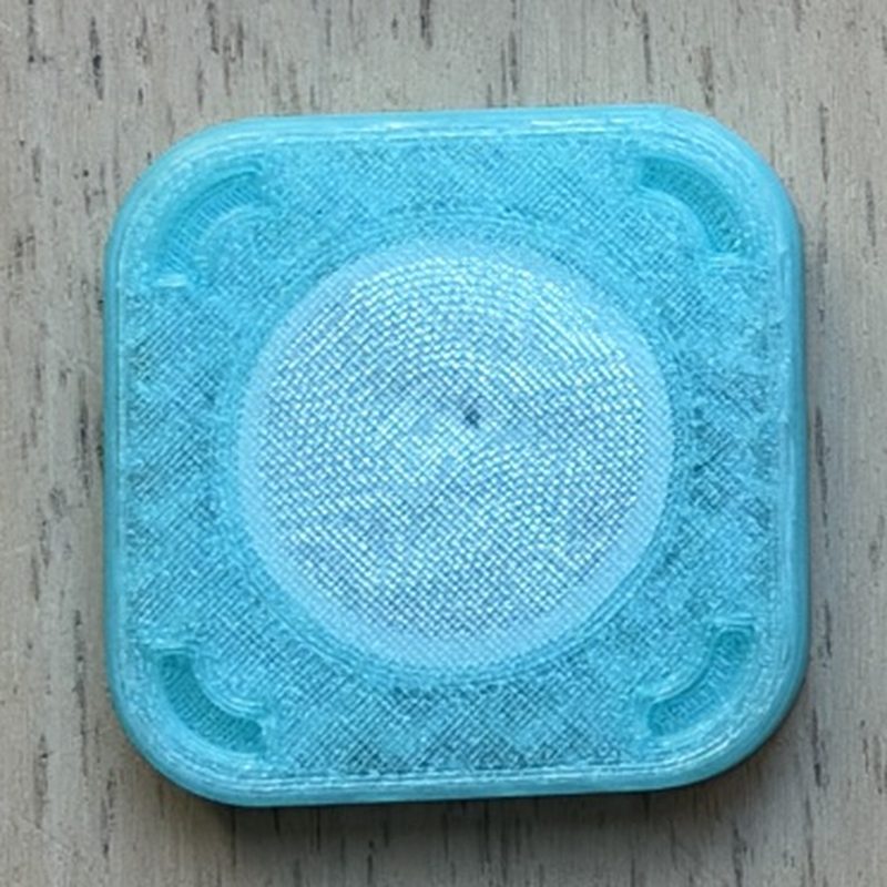 Handmade translucent teal 3D-printed NFC tag