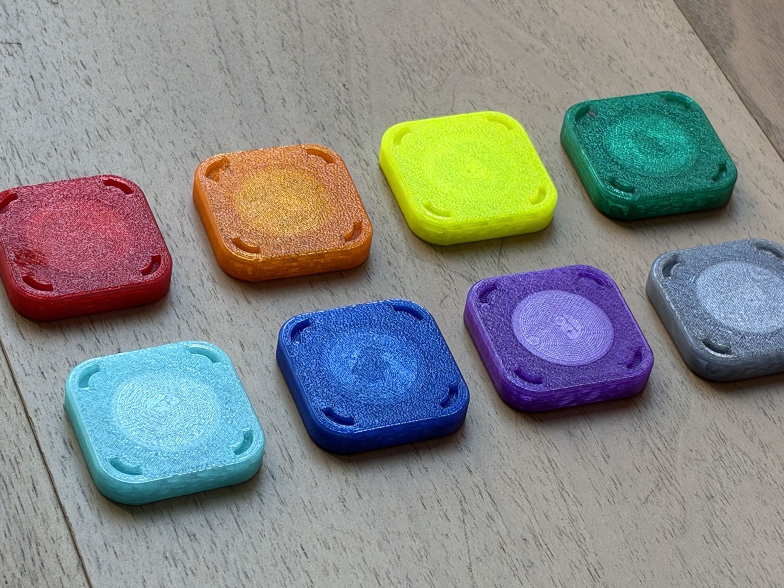 Eight handmade translucent NFC tags in the Funtastic colors